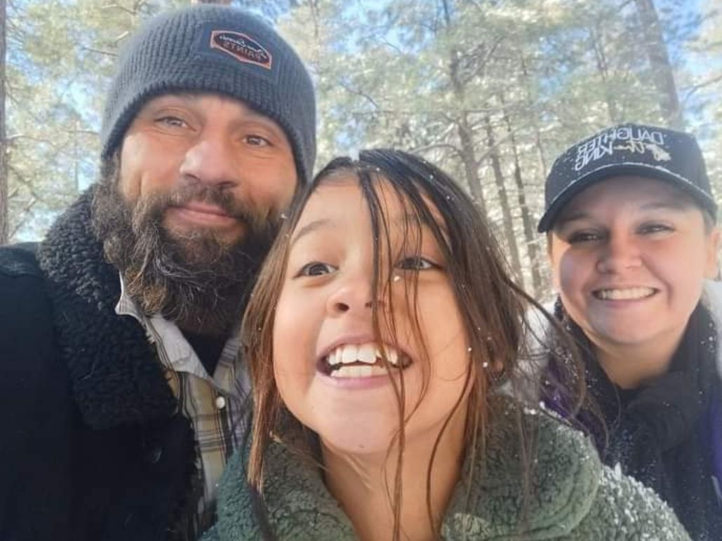 The owner-operators of JW Custom Painting — a faith-based family business